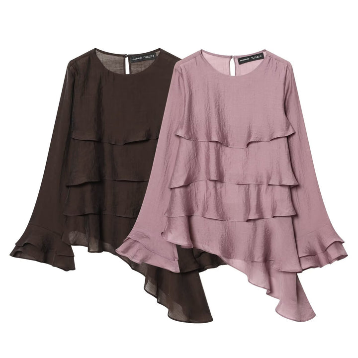 Dame asymmetrisk bluse med volangdetaljer og elegant fall Skjora