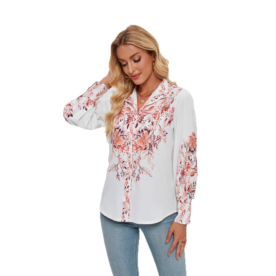 Kvinnenes elegante bluse med blomstermønster og voluminøse ermer