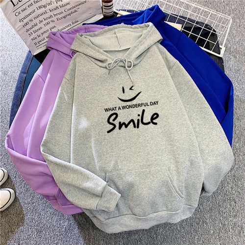 Dame hettegenser med gledelig smile-print Skjora