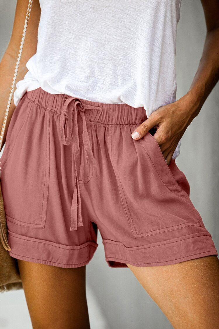 Damer Komfortable Sommer-shorts med elastisk midje og praktiske lommer Skjora