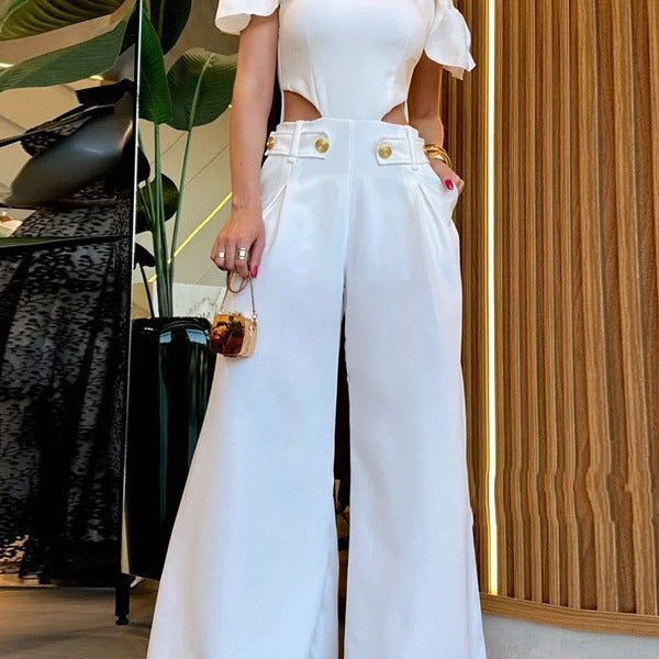 Dame Elegant jumpsuit med snittdetaljer og myke flytende bukseben Skjora