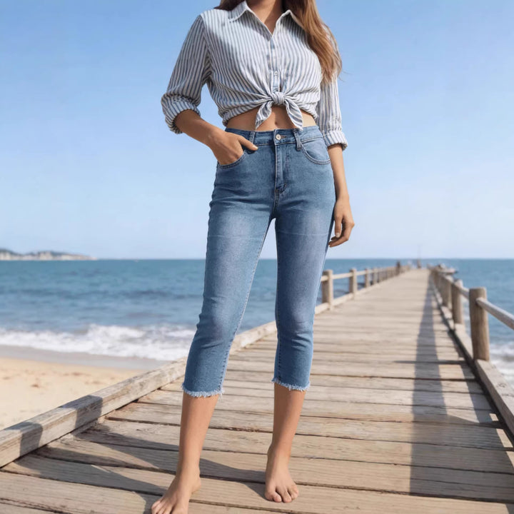 Dame casual high-waist jeans med frynset kant og trendy snitt Skjora