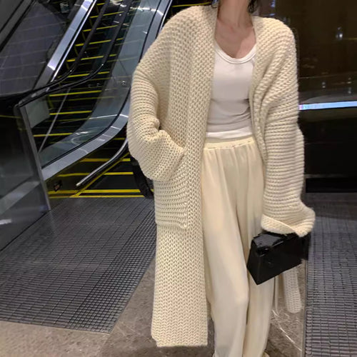 Kvinnens chunky strikket cardigan med åpne lommer og avslappet passform Skjora
