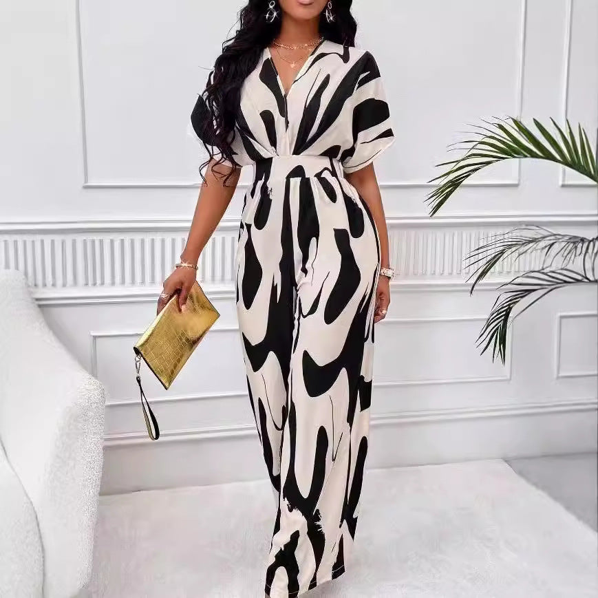 Dame Elegant Jumpsuit med stort mønster og V-hals Skjora