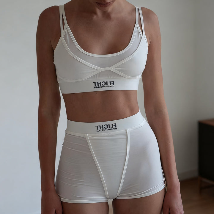 Damer sporty undertøysett med moteriktig crop-top og behagelige shorts Skjora
