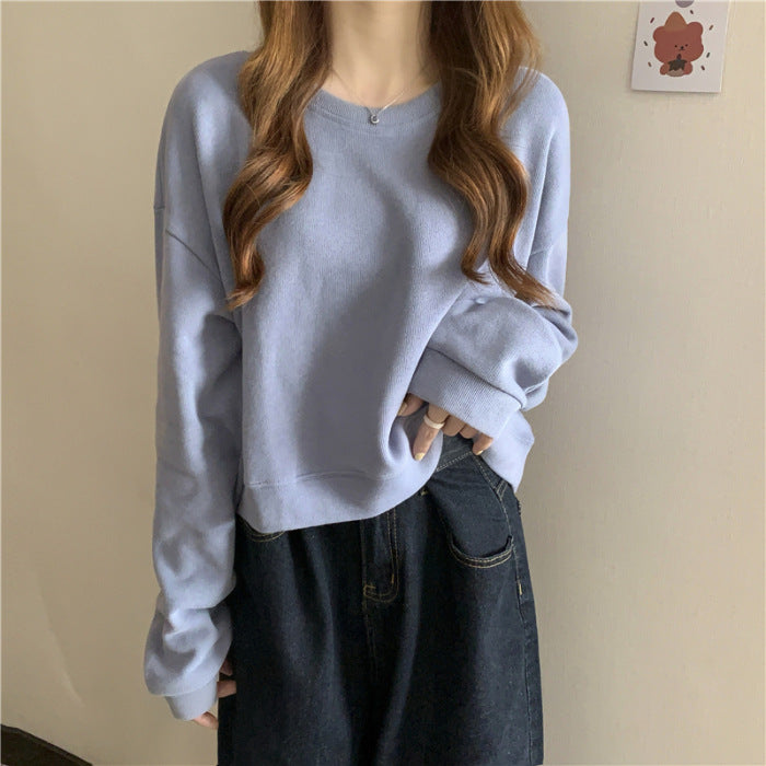 Kvinne casual cropped genser laget av myk bomullsblanding med stilren rund hals Skjora