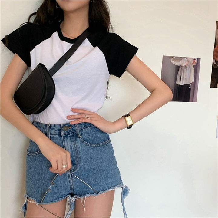 Dame crop top med kontrasterende ermer og komfortabel bomullsblanding