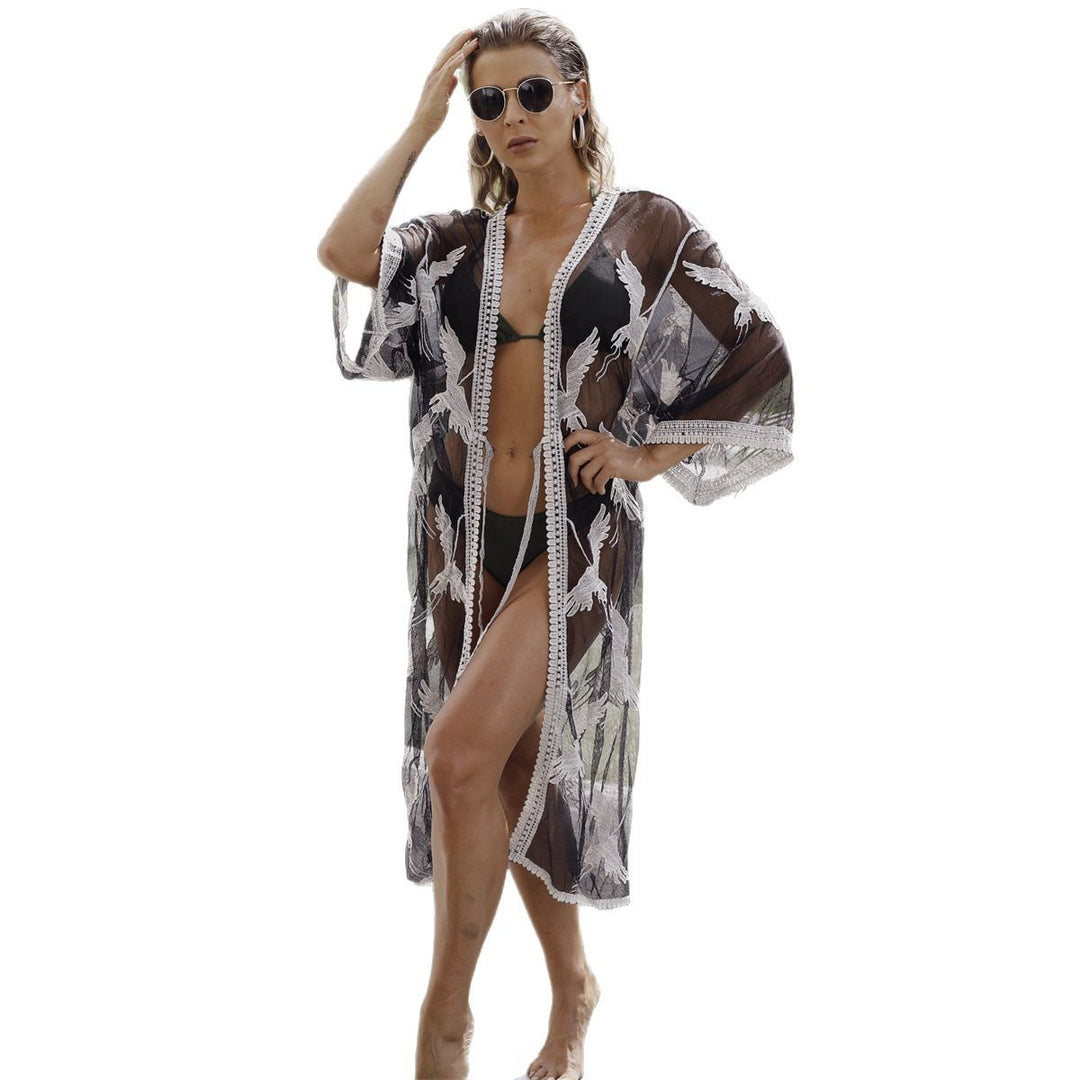 Damer elegant stranddrakt med blomstermønster og belte Skjora