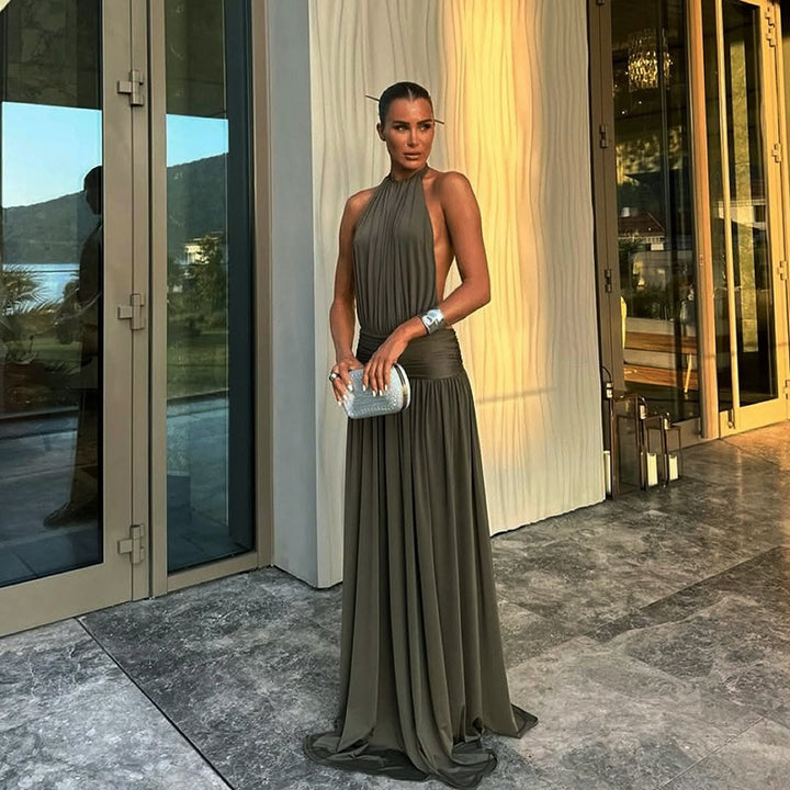 Kvinne elegant max kjole med høykvalitets halterneck design og flytende stoff
