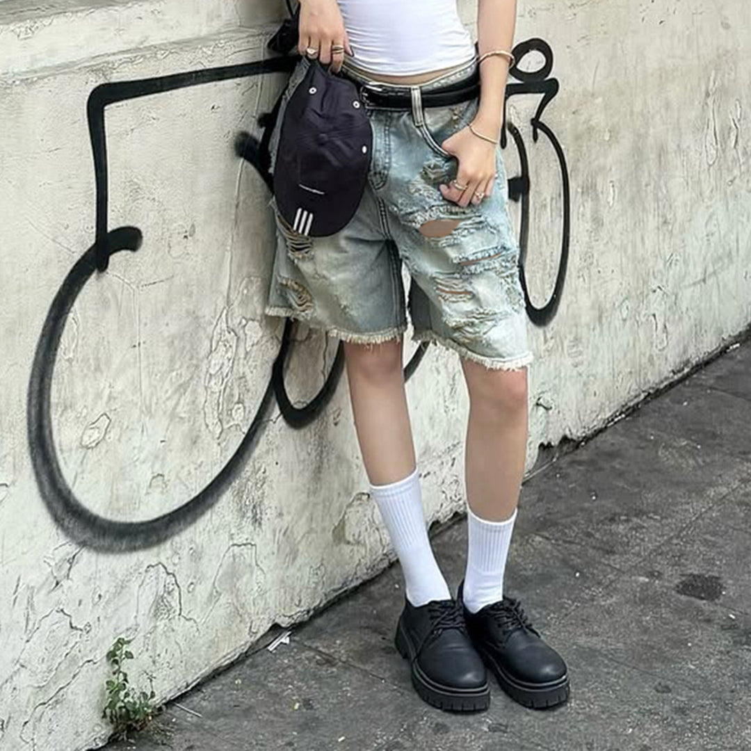 Dame Z ødelagte denimshorts med høy midje og flikete kanter Skjora