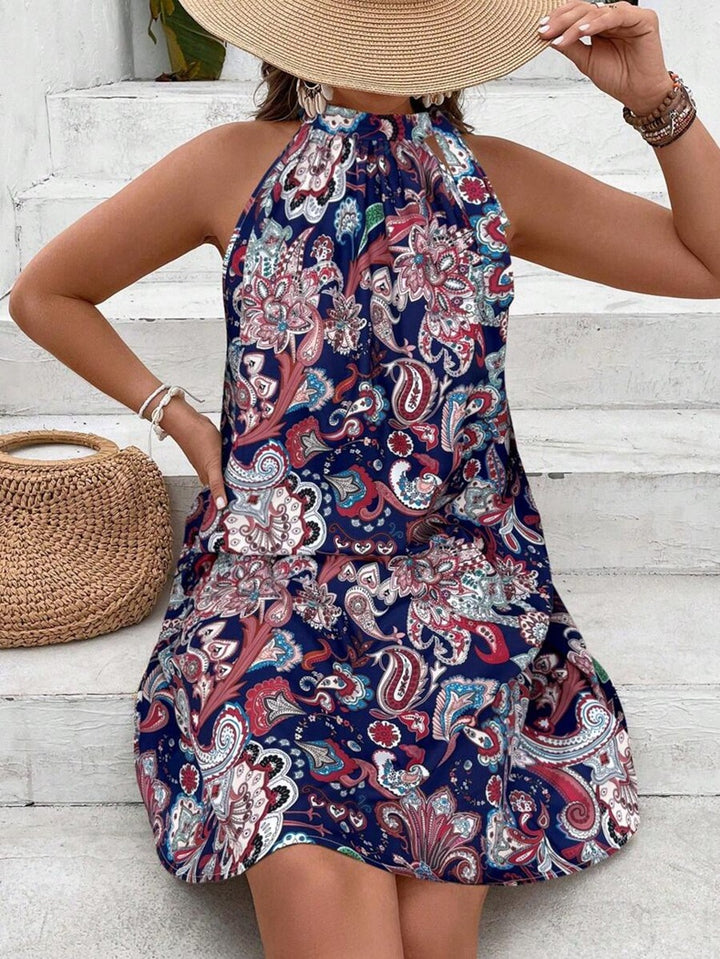 Dame frit dress i moteriktig halterdesign med blomstrete paisley-mønster Skjora