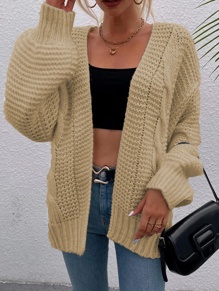 Kvinnens chunky strikket cardigan med komfortable åpne lommer og avslappet passform Skjora