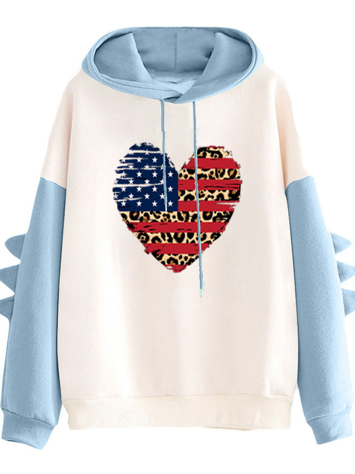 Kvinnes hoodie med unikt hjerte design og trendy detaljer Skjora