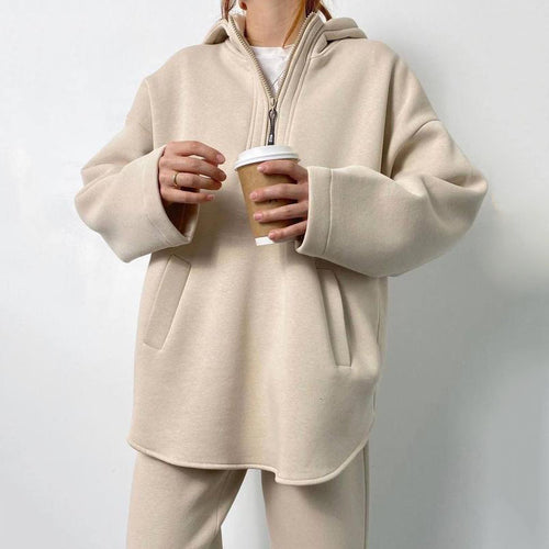 Kvinnelig oversized fleece treningsdrakt med høy krage og glidelås Skjora
