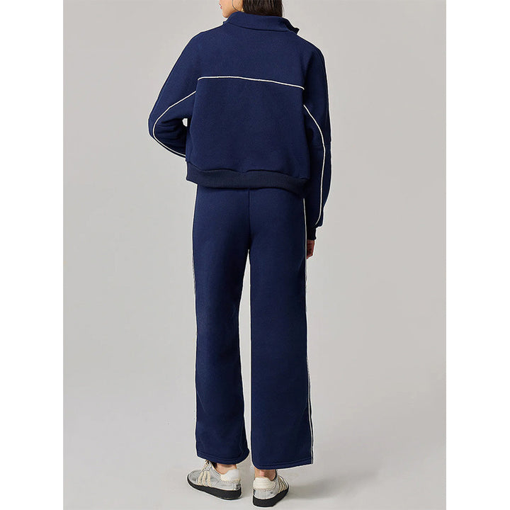 Kvinnelig sporty fritidssuit med høy krage og elastisk linning Skjora