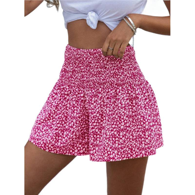 Dame shorts med elastisk midjebånd og blomsterdesign Skjora
