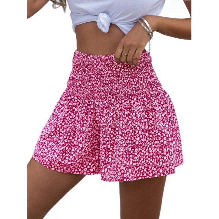 Dame shorts med elastisk midjebånd og blomsterdesign Skjora