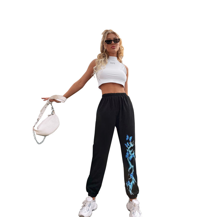 Kvinnecasual joggebukser med fargerik sommerfugl- og lyn-design Skjora