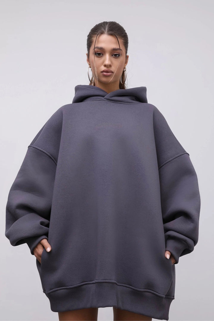 Dame Oversized Hettegenser med Casual Lommer og Trendy Design Skjora