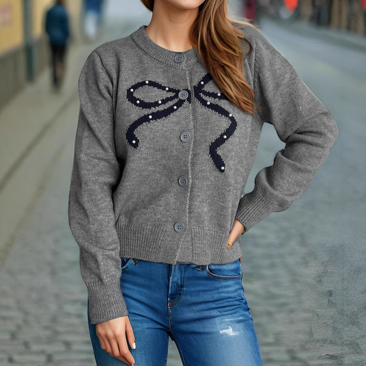 Kvinners koselige cardigan med bue-motiv Skjora