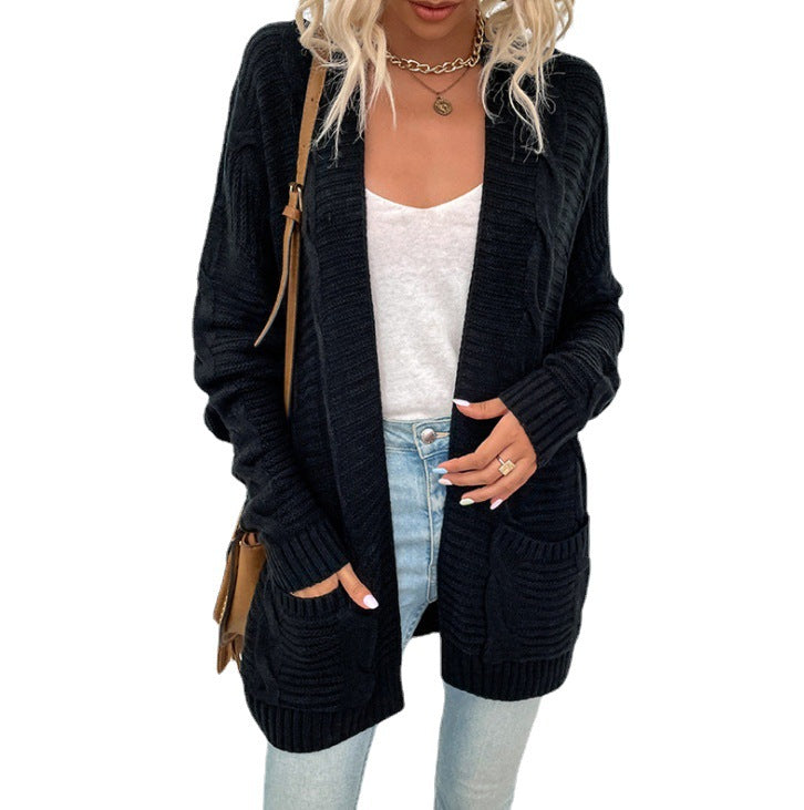 Kvinne chunky strikk cardigan med lommer og åpen frontdesign Skjora