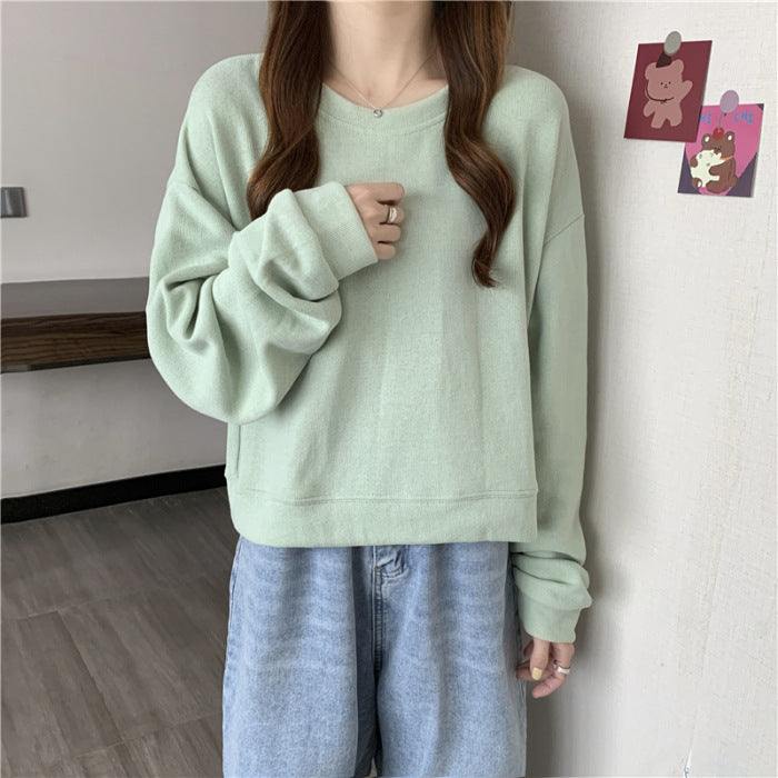 Kvinne casual cropped genser laget av myk bomullsblanding med stilren rund hals Skjora