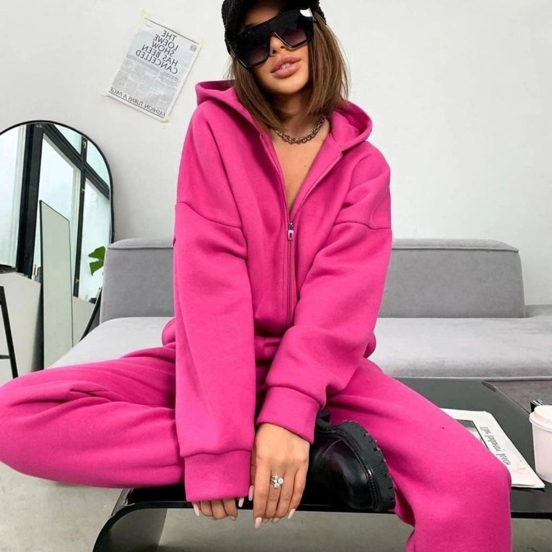 Kvinnelig sporty fleece jumpsuit med hette og glidelås Skjora