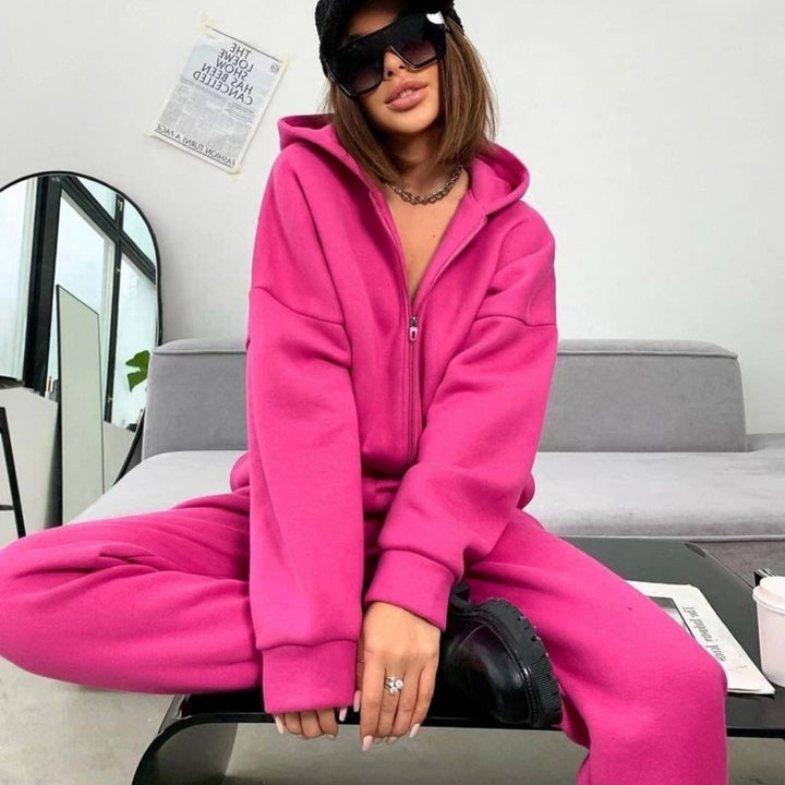 Kvinnelig sporty fleece jumpsuit med hette og glidelås Skjora