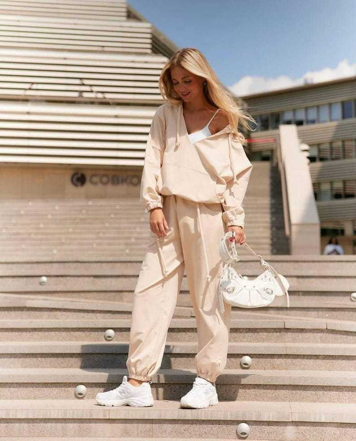 Dame casual jumpsuit med dyp V-hals og praktiske lommer
