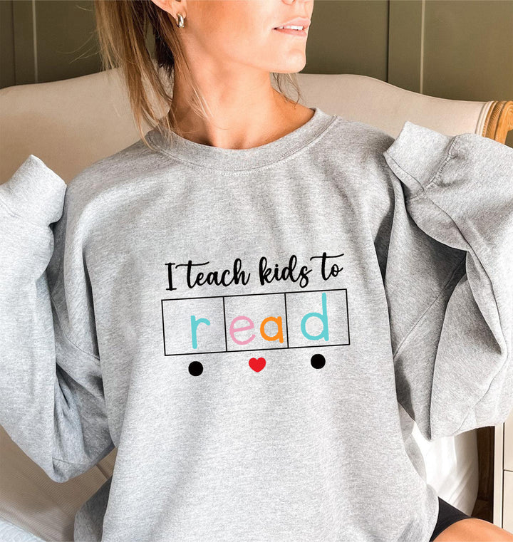 Kvinne sweatshirt med kreativt undervisningsmotiv Skjora