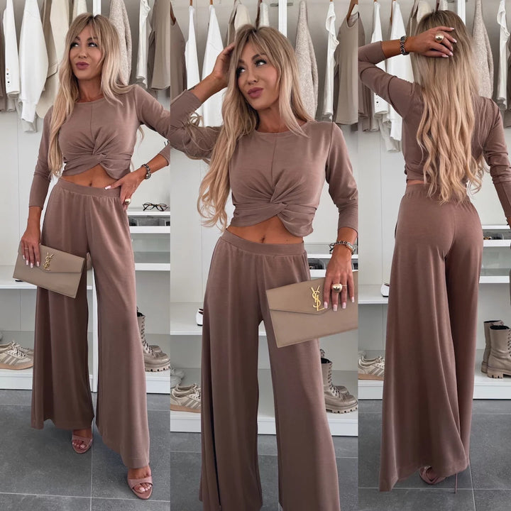 Kvinnes elegant fritidssett med crop top og vide bukser