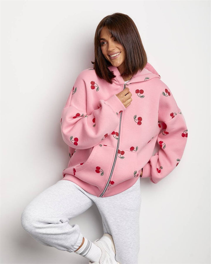 Dame hoodie jakke med friskt kirsebærmønster og komfortable lommer Skjora