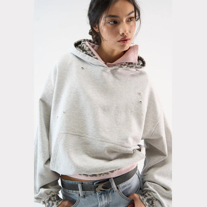 Dame hoodie med moteriktig dyremønster og drømmende snitt Skjora