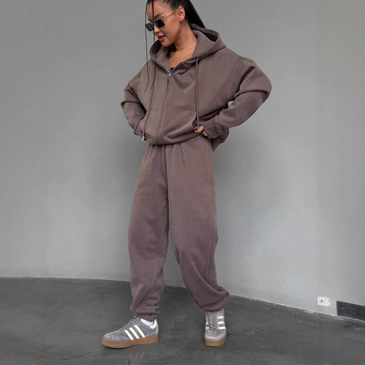 Kvinnekoselig hettegenser jumpsuit med høy kvalitets glidelås og avslappet passform