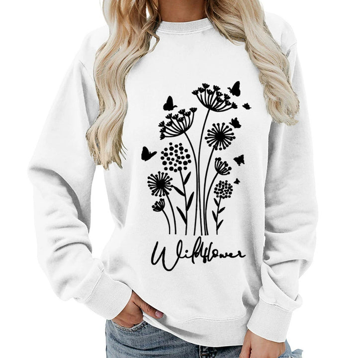 Kvinnelig sweatshirt med blomstertrykk av villblomster og koselig innerfor Skjora