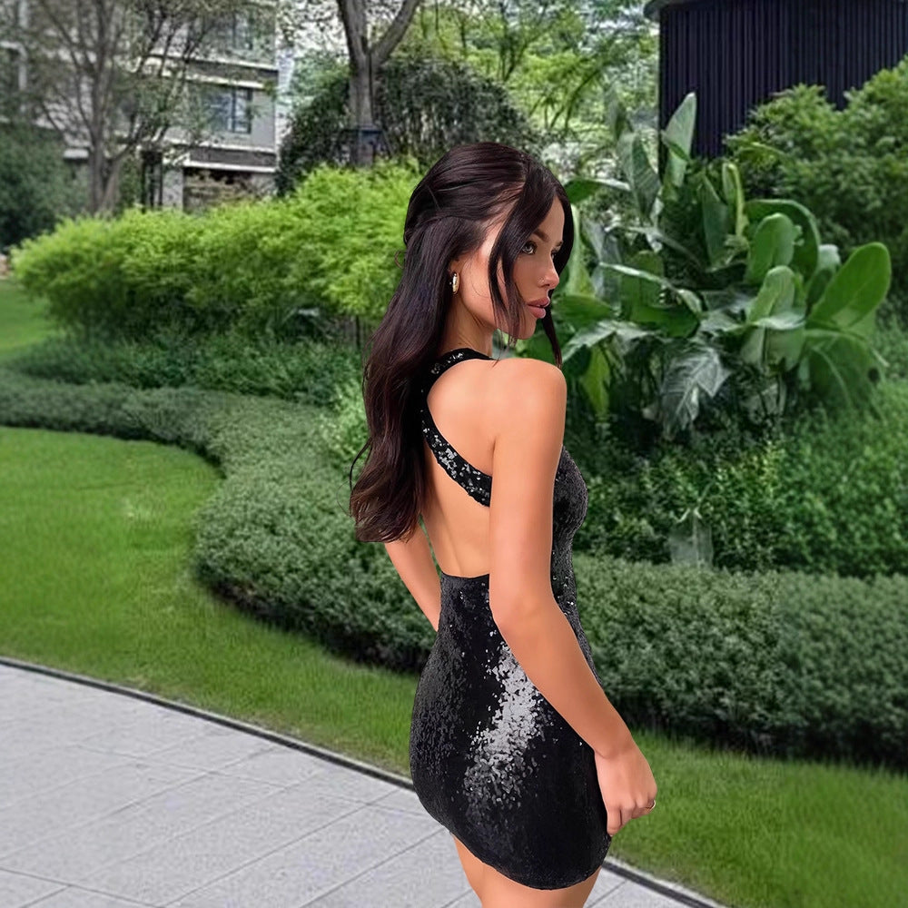 Dame glitrende mini kjole med glitrende overmateriale og racerback design Skjora