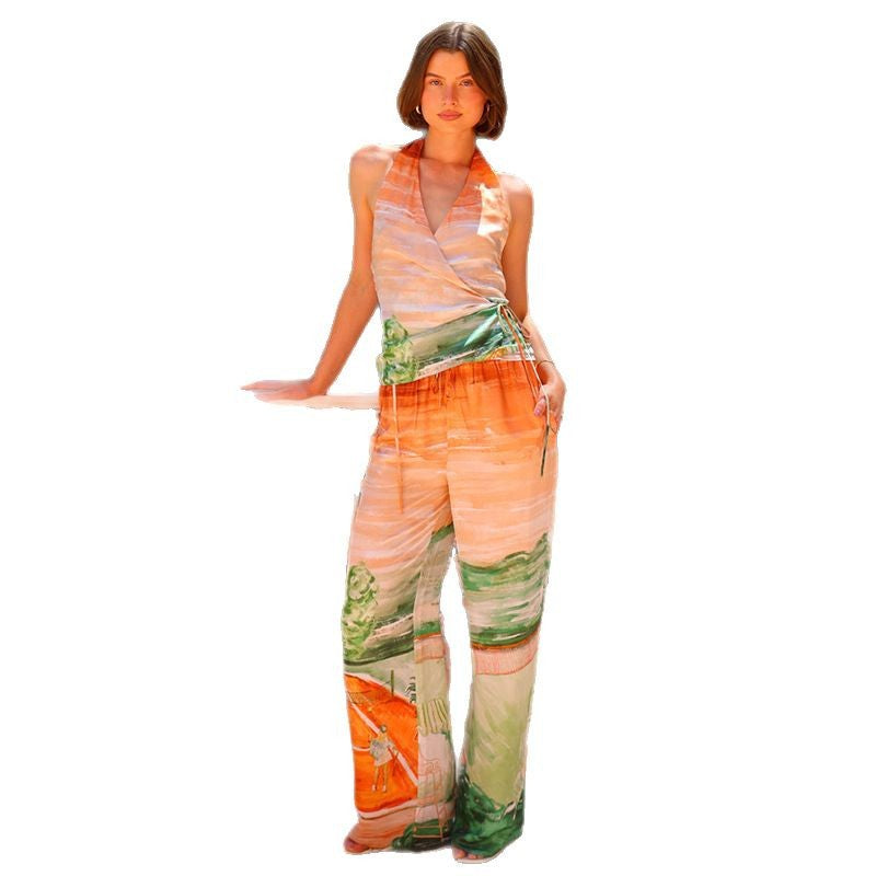 Kvinnens omslags jumpsuit med blomstermønster og elastisk midjebånd Skjora