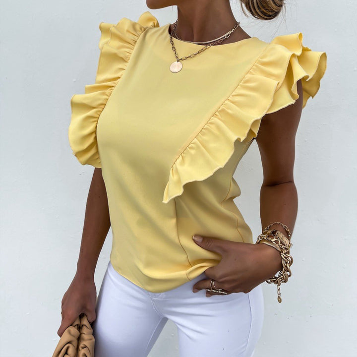 Kvinnenes elegante bluse med volangermer Skjora