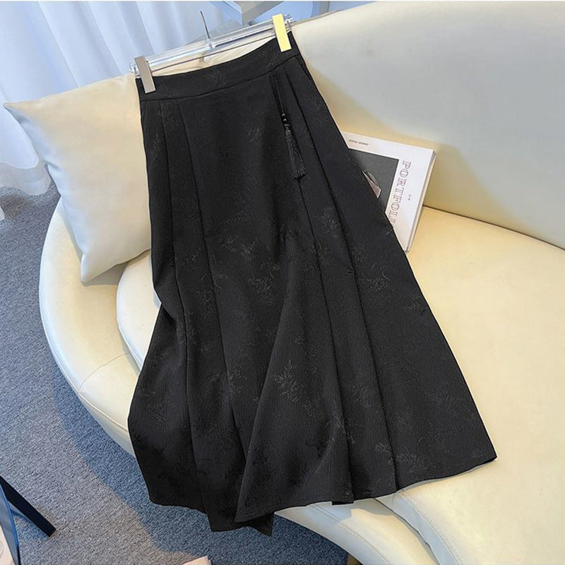 Damenes elegante midi skjørt med teksturert stoff og flytende snitt