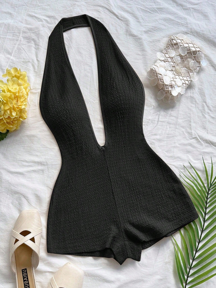 Dame bodysuit med dyp V-hals og strukturert overflate Skjora