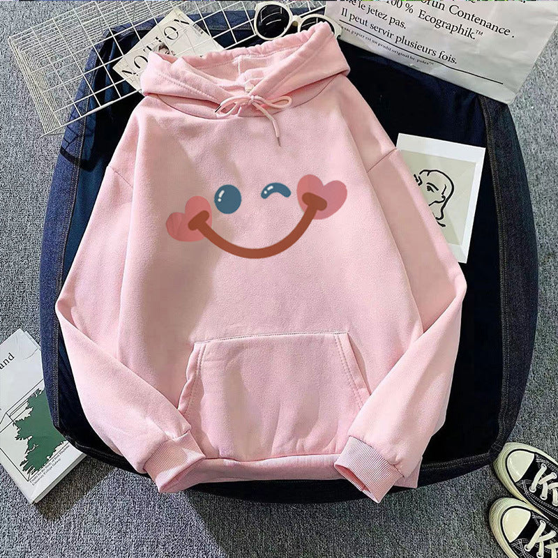 Dame hettegenser med glad smiley-design Skjora