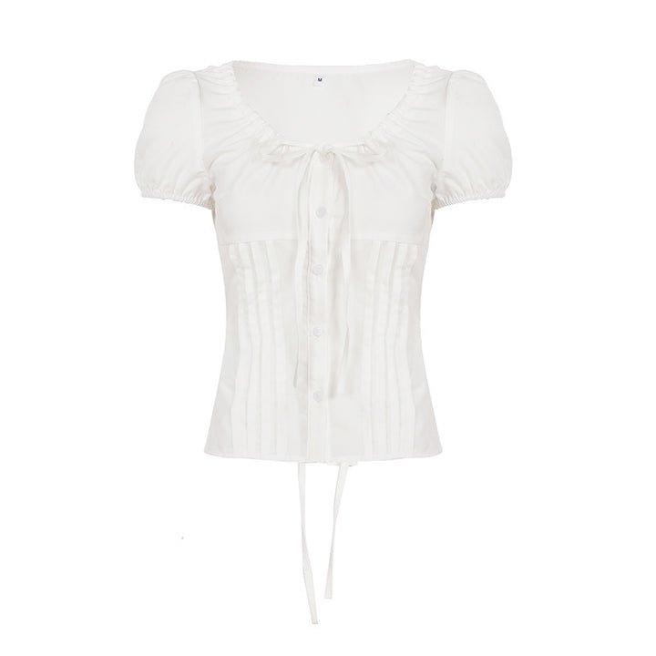 Dame Elegant bluseoverdel med ruffle-detaljer og figurtilpasset silhuett Skjora