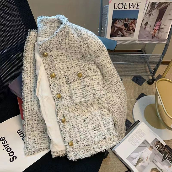 Kvinnenes elegante tweedjakke med gullknapper Skjora