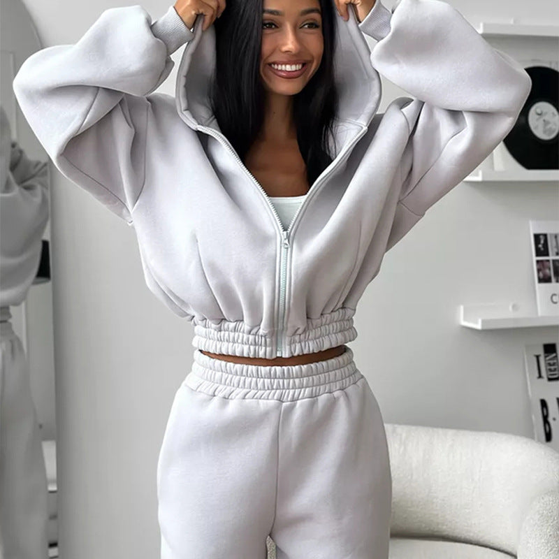 Kvinners sporty fleece jumpsuit med hette og løs passform Skjora
