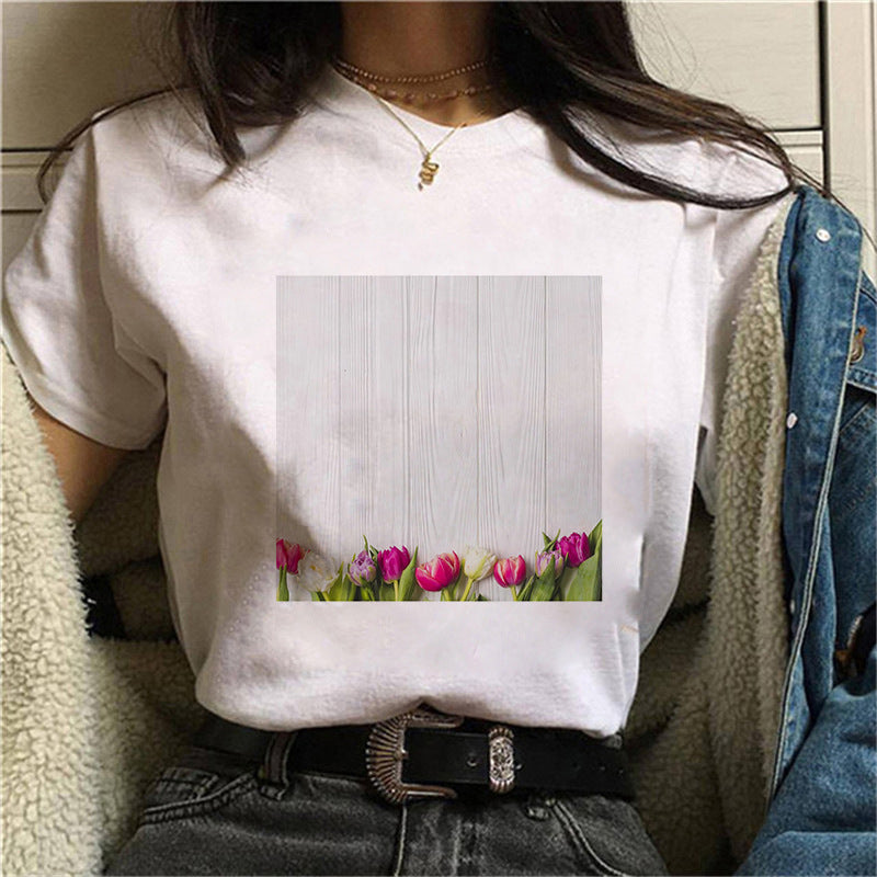 Dame T-skjorte med blomstertrykk og V-hals Skjora