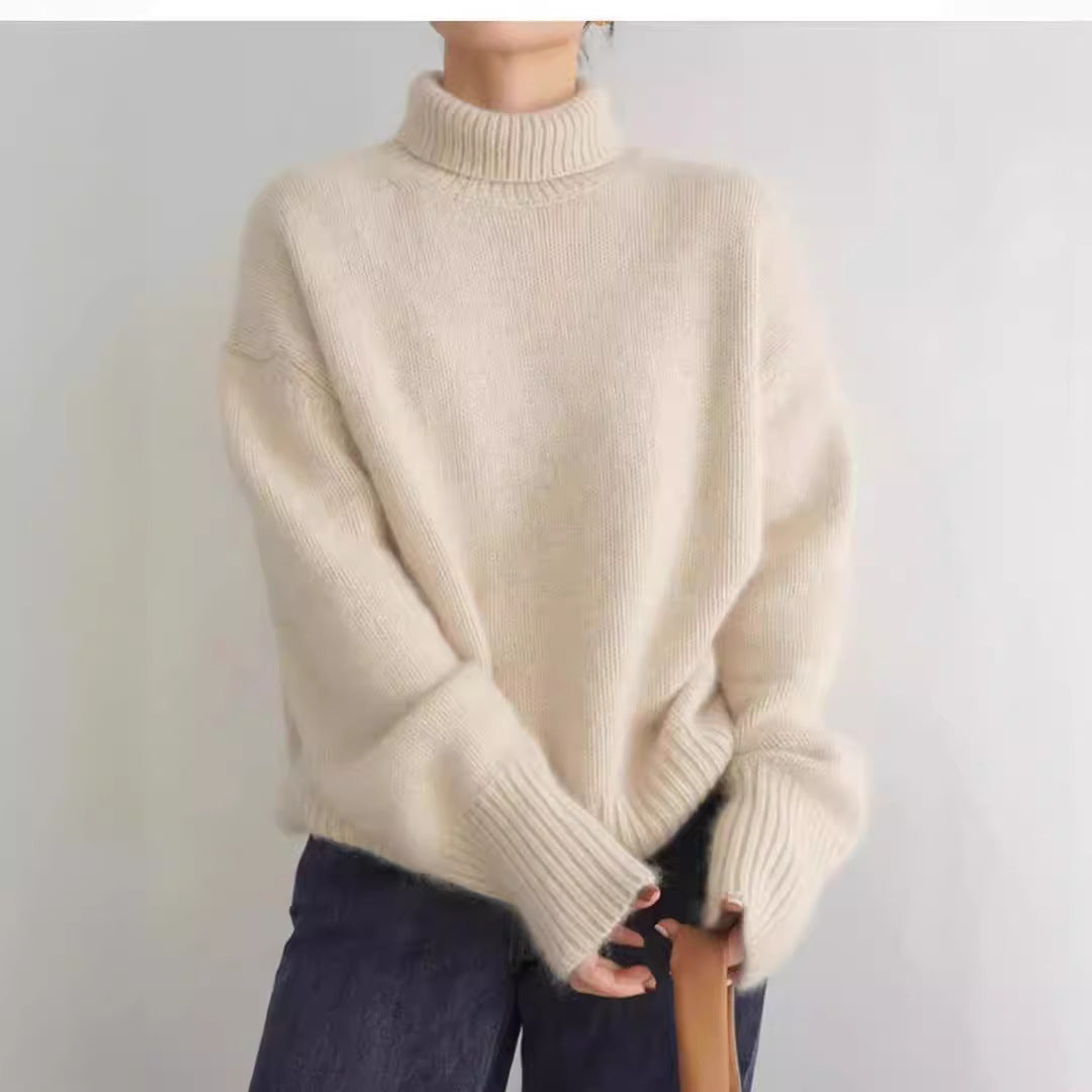 Kvinnes cashmere rullehalsgenser med løs passform og elegant tekstur Skjora