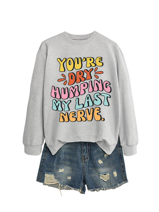 Dame sweatshirt med munter tegneserie slagord og uformell snitt Skjora