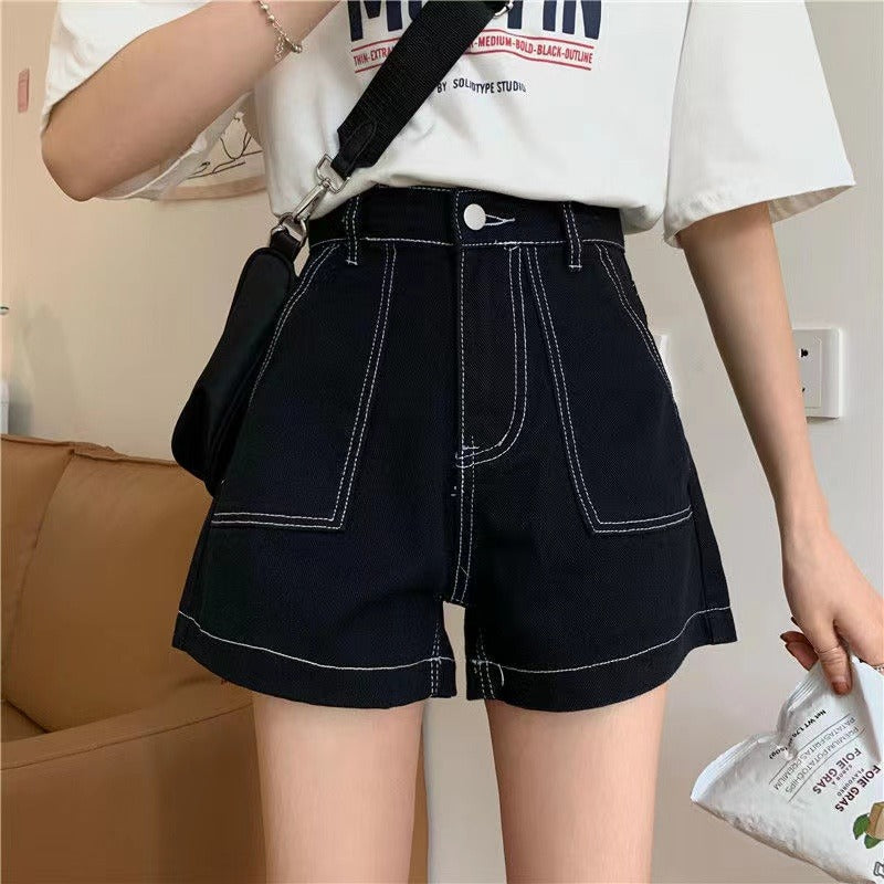 Damer Høy midje shorts med en avslappet kutt og praktiske lommer