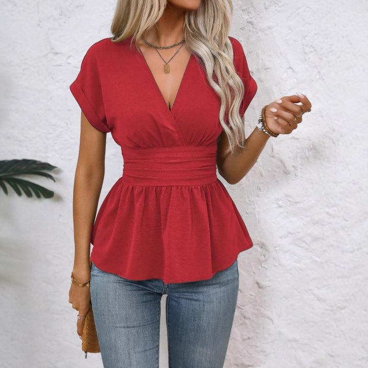 Dame Peplum-bluse med V-hals og belte i midjen Skjora