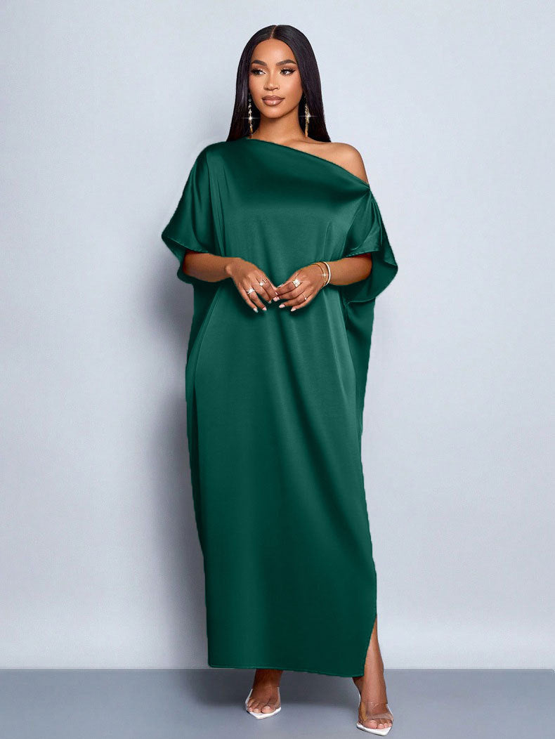 Dame maxikjole med asymmetrisk snitt og elegant fall Skjora